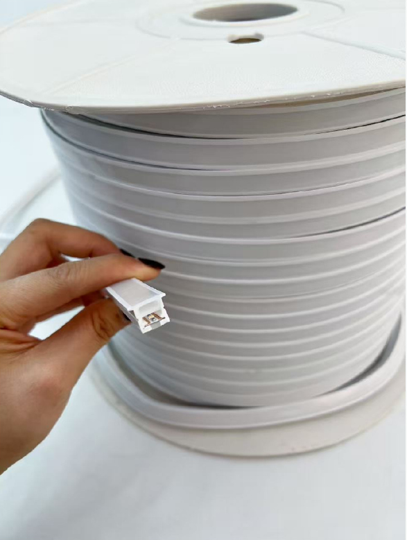 Silicone-profile strip on a reel with its end shown